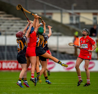Orla Cronin rises to pass to orla Cotter